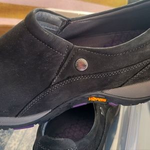 Dansko black slip on sneakers